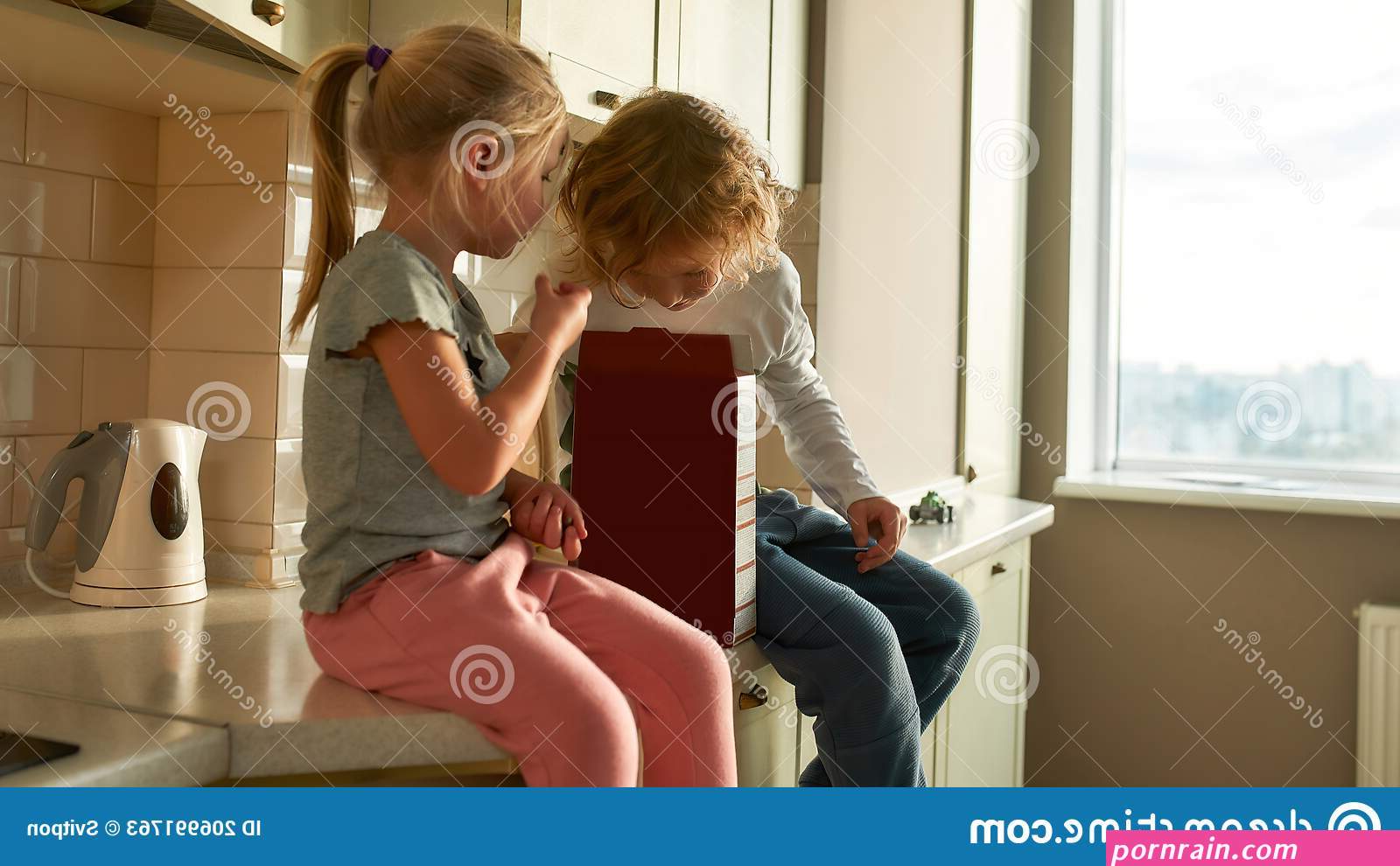 sister sits on brother before mom comes home