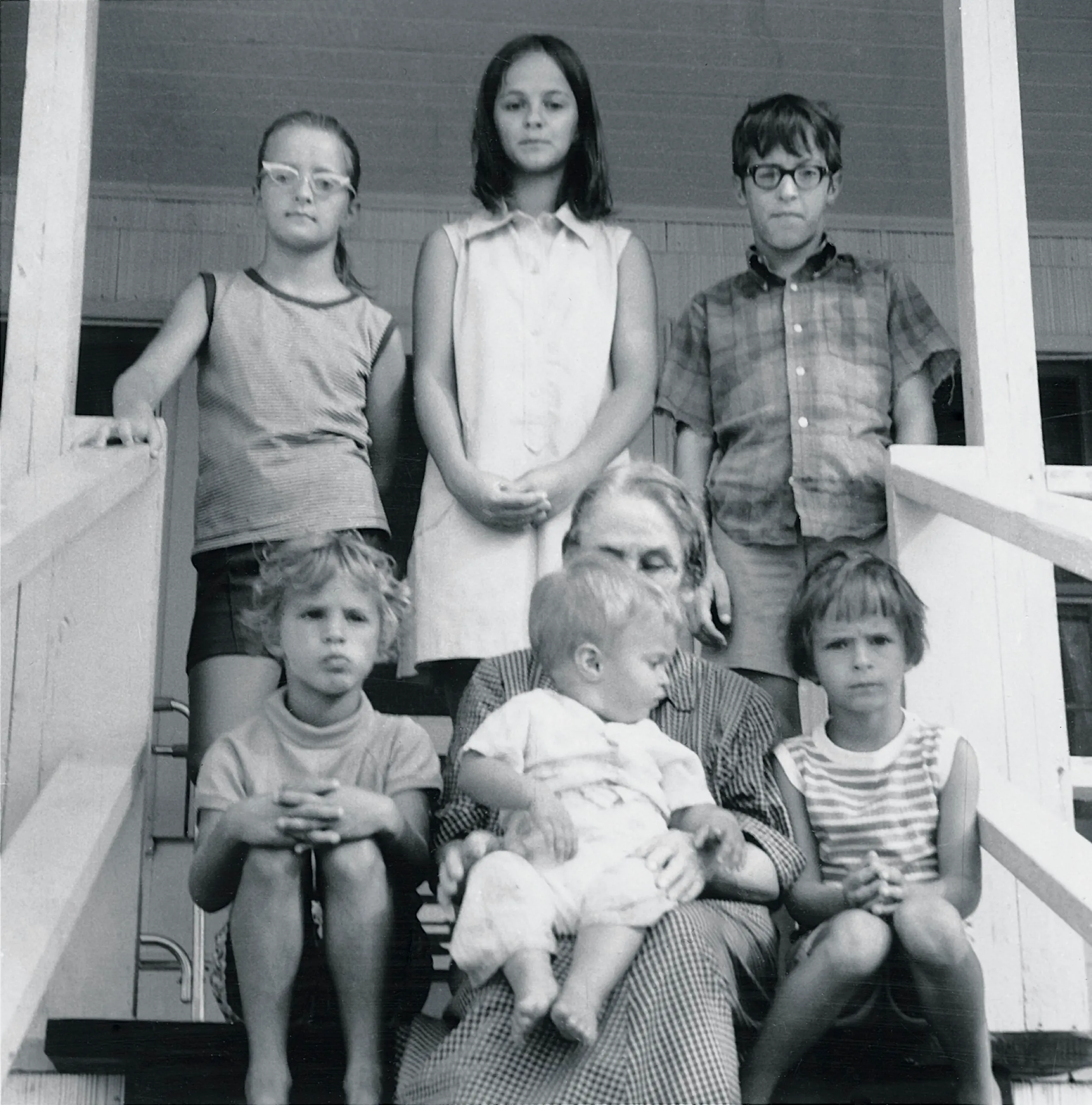 sister sits on brother before mom comes home