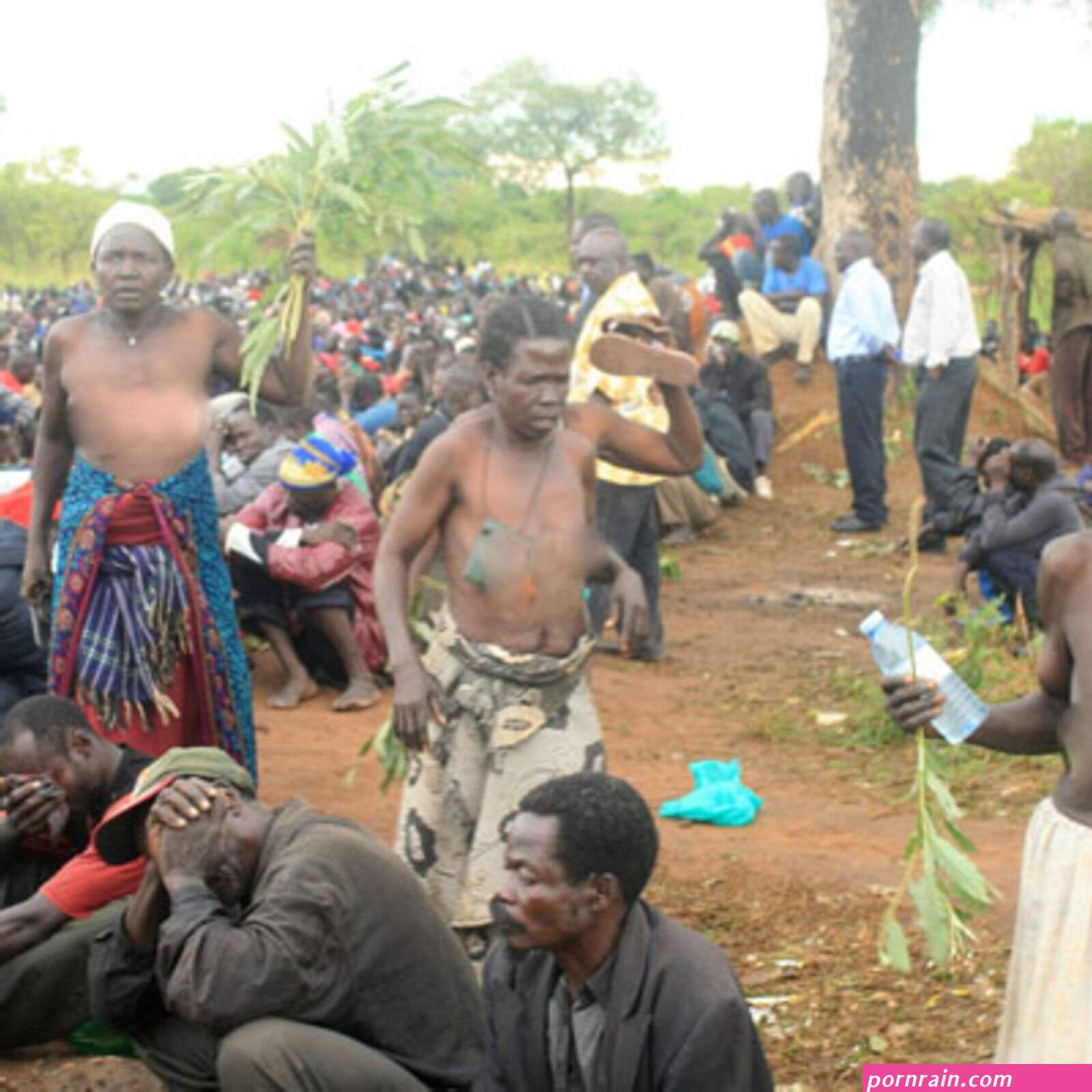 ugandan woman stripped naked