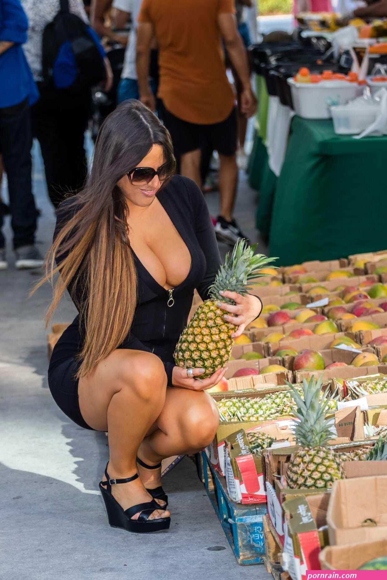 claudia romani gets one with nature in her black dress