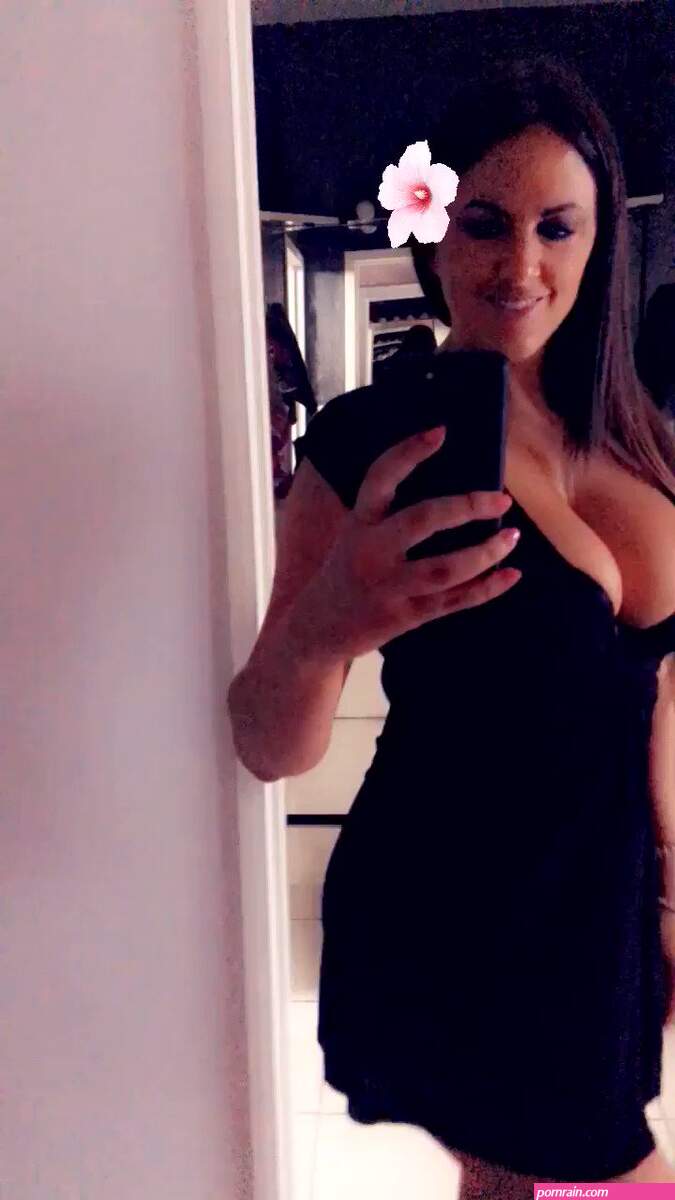 claudia romani gets one with nature in her black dress