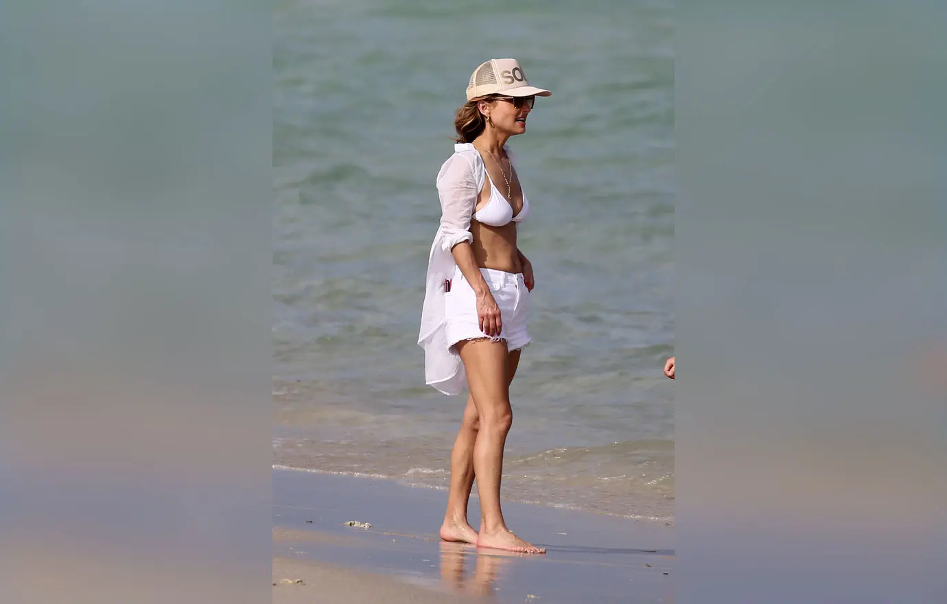 giada de laurentiis relaxes with shane farley on the beach in miami