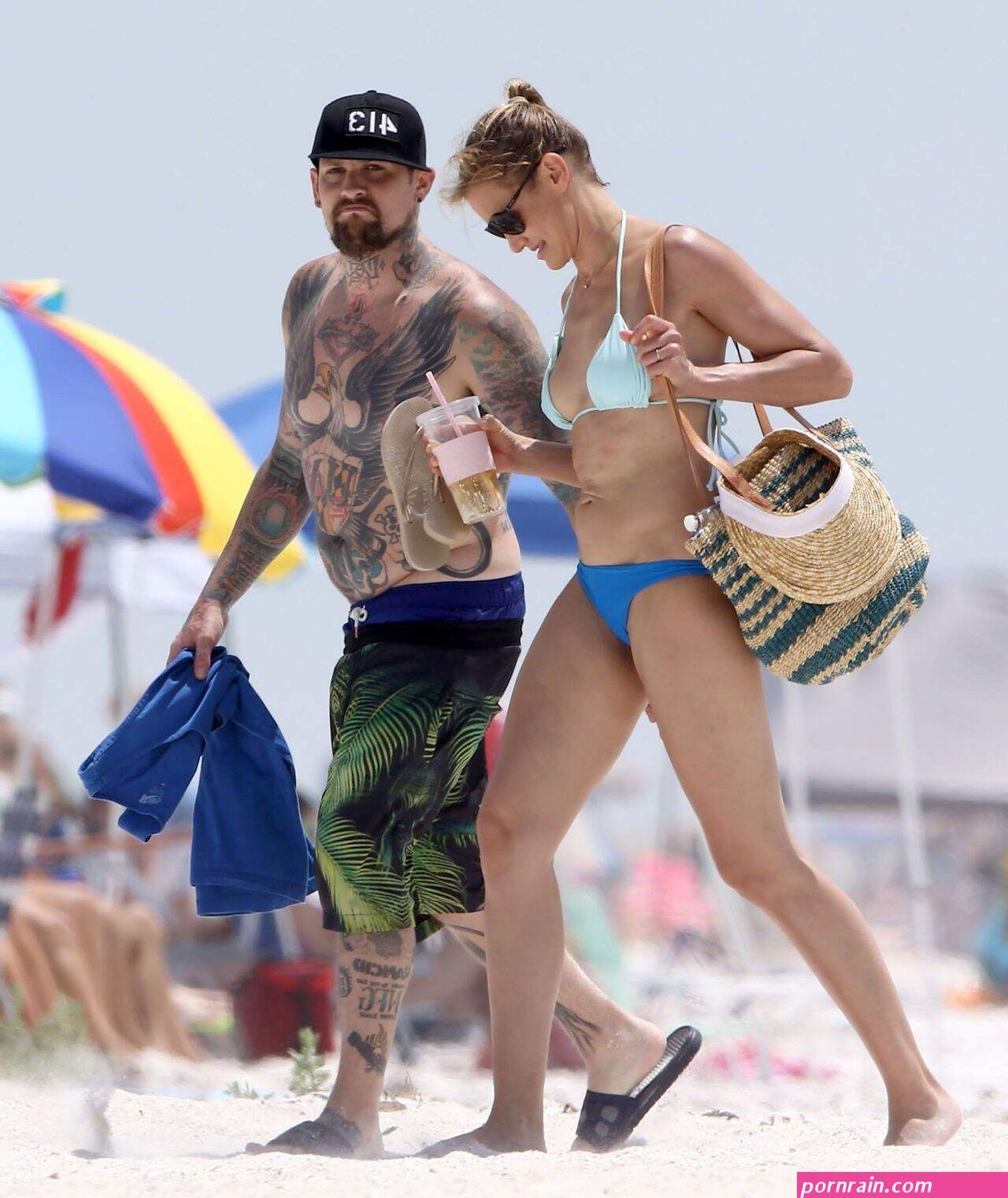 jessica alba soaks up the sun in miami with her husband cash warren