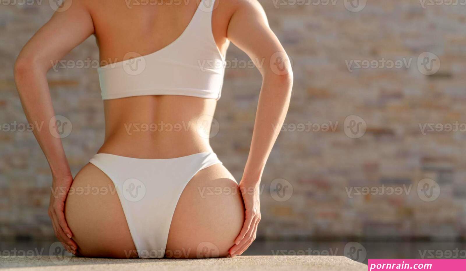 woman in white bikini with big beautiful booty sitting on the edge of the pool. 12503881 Stock Photo at Vecteezy