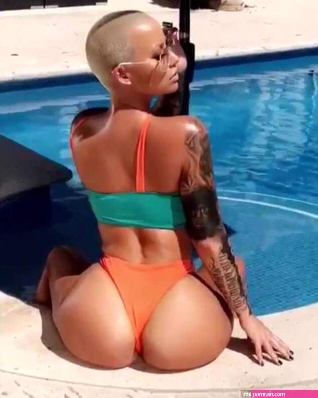 Amber Rose looks booty-ful in orange swimsuit after discussing life after  breast reduction surgery | Daily Mail Online