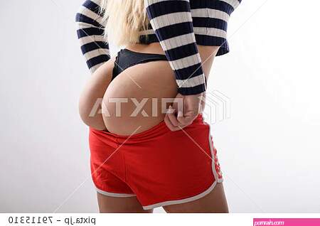 A blonde with long hair puts on sports red...