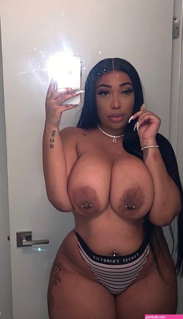 Thick ebony with massive natural tits