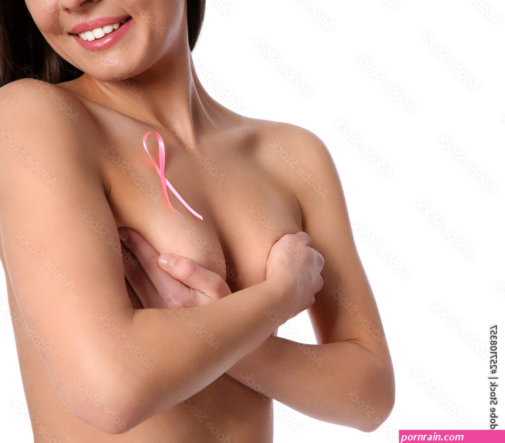 Foto de Naked woman with silk ribbon on white background, closeup. Breast  cancer awareness concept do Stock | Adobe Stock