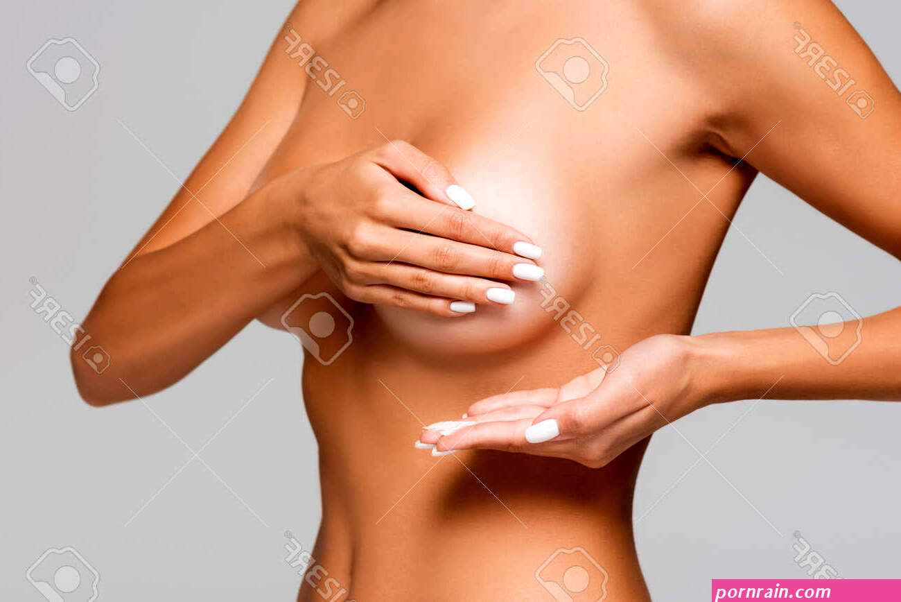 Cropped View Of Nude Woman Covering Breast And Holding Cosmetic Cream  Isolated On Gray Stock Photo, Picture And Royalty Free Image. Image  158706620.