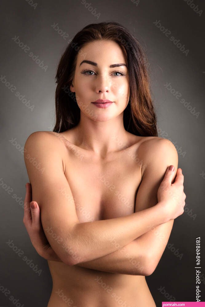 nude woman covering her breast Stock Photo | Adobe Stock