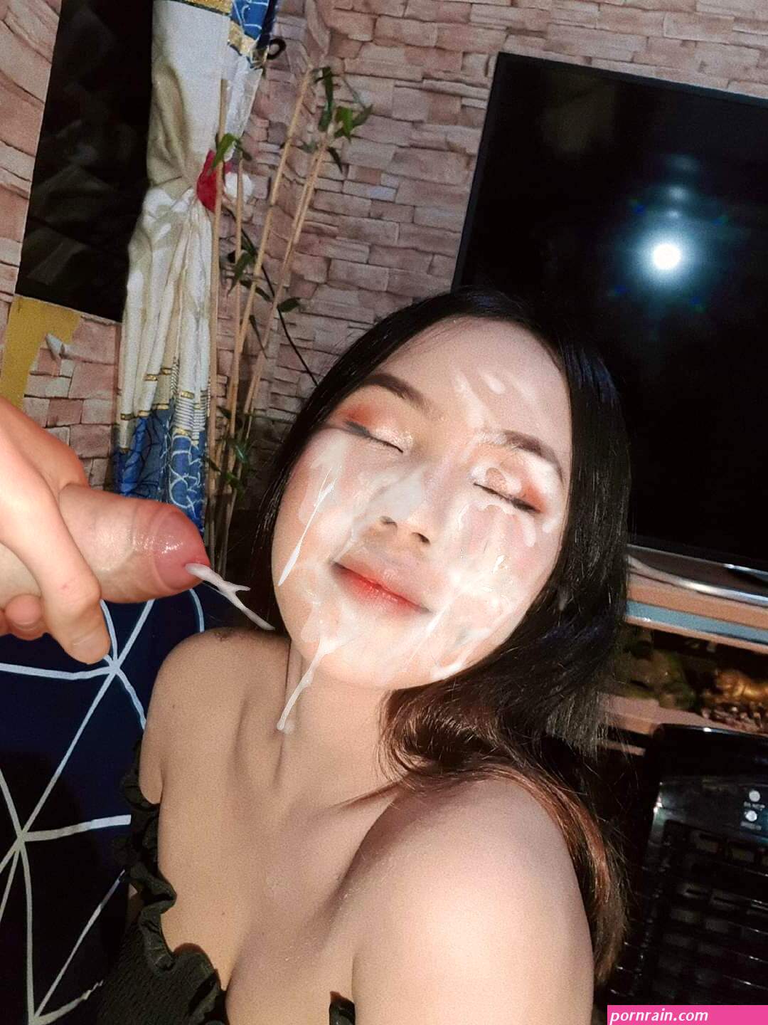 Pretty asian girl looking great cum faked
