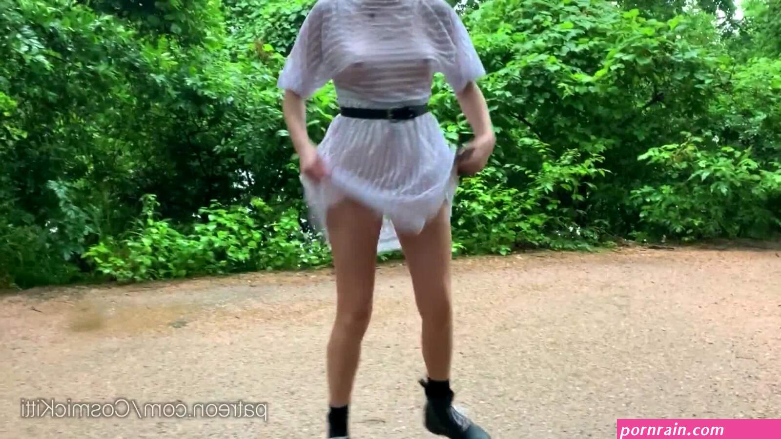 Sexy vintage montage of soaking wet babe in the rain with a see-through  dress.