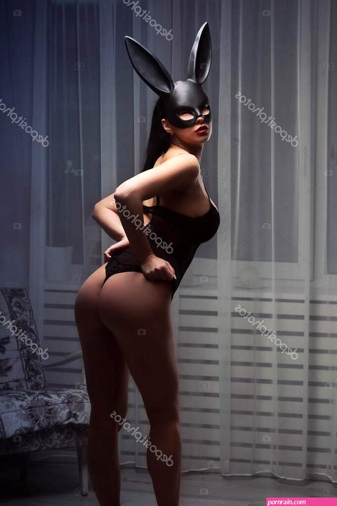 Brunette woman with sexy lingerie and fluffy bunny ears Stock Photo by ©fenixlive 102840288