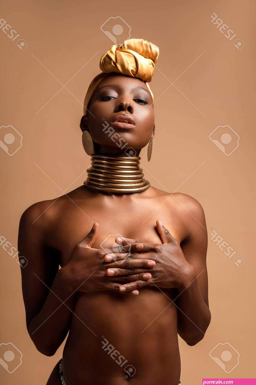 Sexy Naked Tribal Afro Woman Posing Isolated On Beige Stock Photo, Picture and Royalty Free Image. Image 145424348.