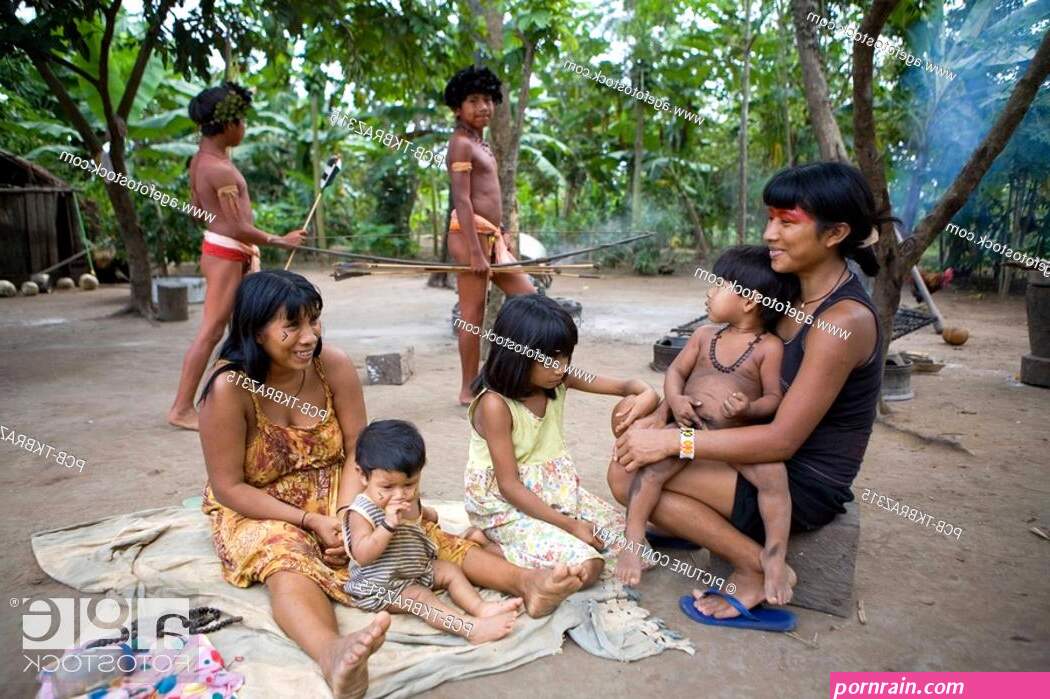 Portrait of a Xingu Indian family in the Aamzone Brazil Stock Photo Picture And Rights Managed Image. Pic. PCB-TKBRAZ315