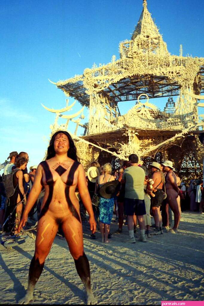 Body paint to be a walking nude Burning Man logo shot in front of Mosoleum by K. Brads Photos