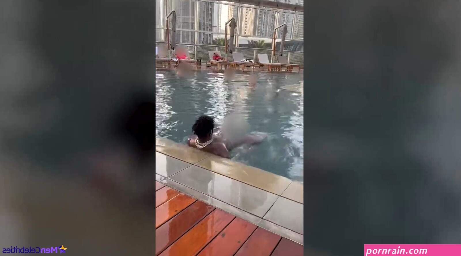 Fully naked Antonio Brown has fun with a woman in the pool
