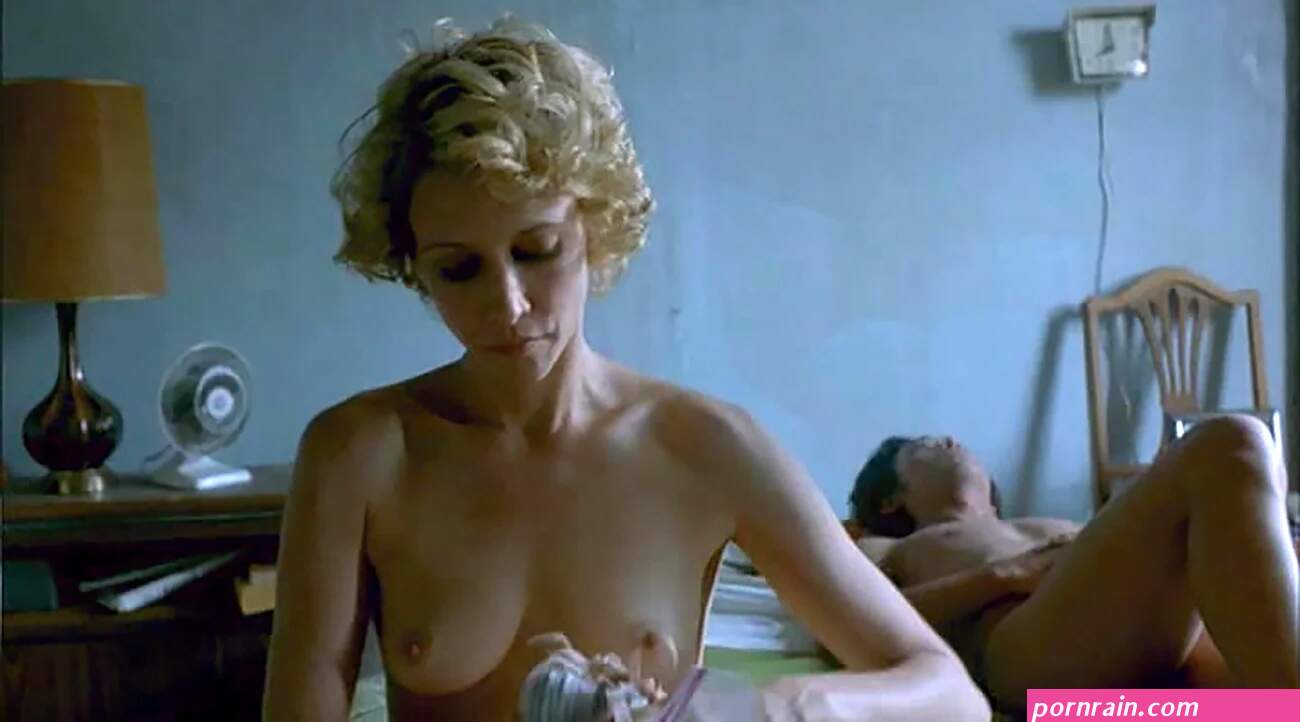 her bare breasts and butt before