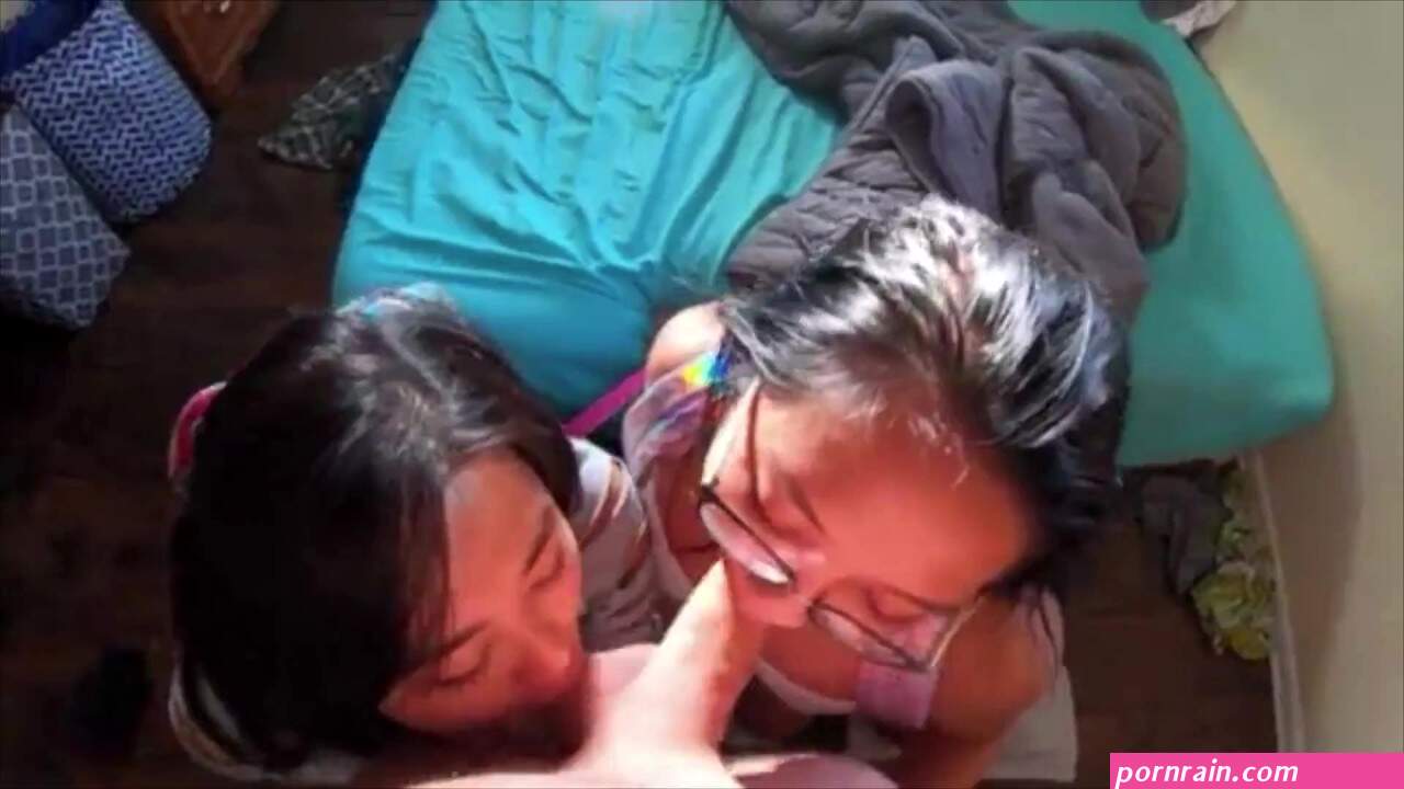 2 Cute Asian Teens Giving a Lucky Guy the best Blowjob in this Awesome Threesome