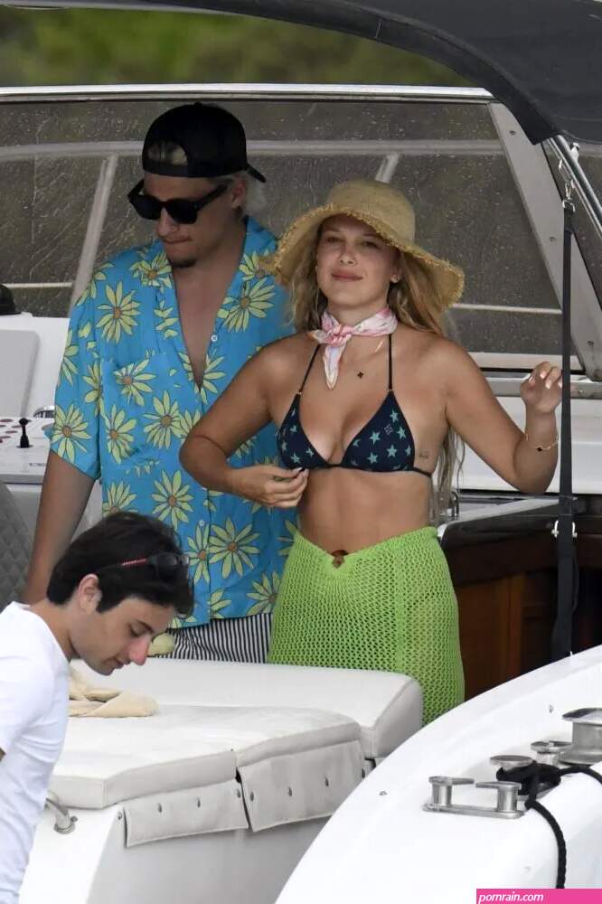Millie Bobby Brown Shows Beautiful Boobs in Bikini on a Boat in Sardinia