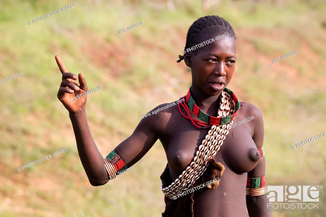 Portrait of a Young topless teen member of the Bena Tribe Omo Valley Ethiopia Stock Photo Picture And Rights Managed Image. Pic. X5T-2693236