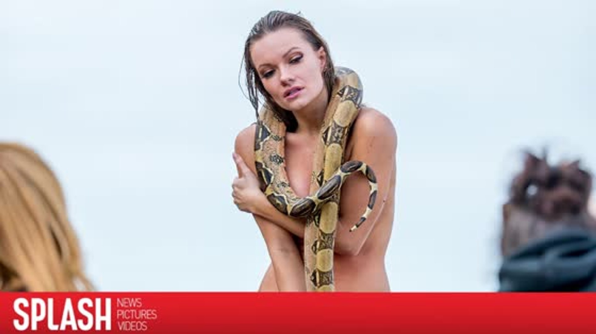 Caitlin OConnor Poses Topless With a Live Snake