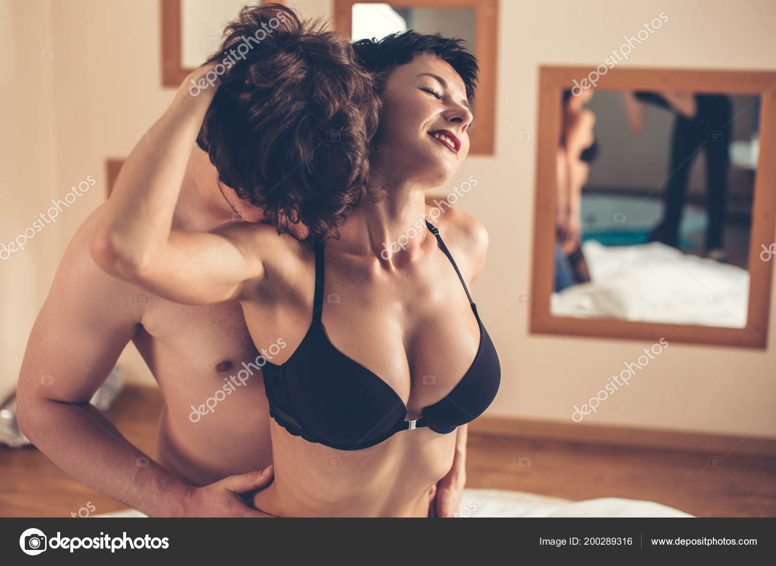 Hot attractive lovers having sex in hotel. Stock Photo by ufabizphoto 200289316
