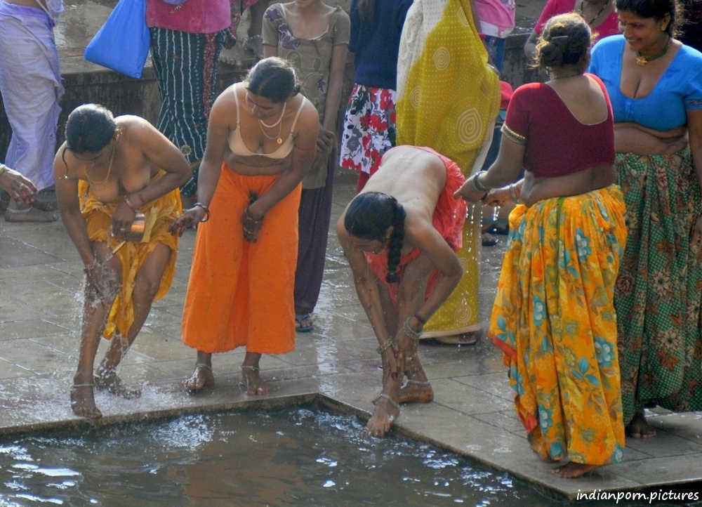 Indian women naked by the river