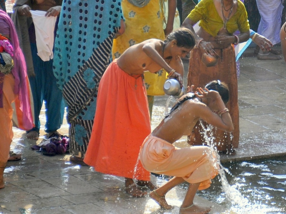 Indian women naked by the river