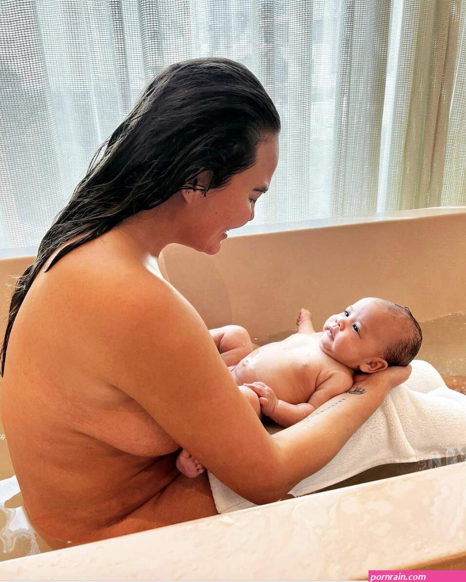Chrissy Teigen Shares a Candid Nude Photo of Her and Baby Esti Taking a Bath