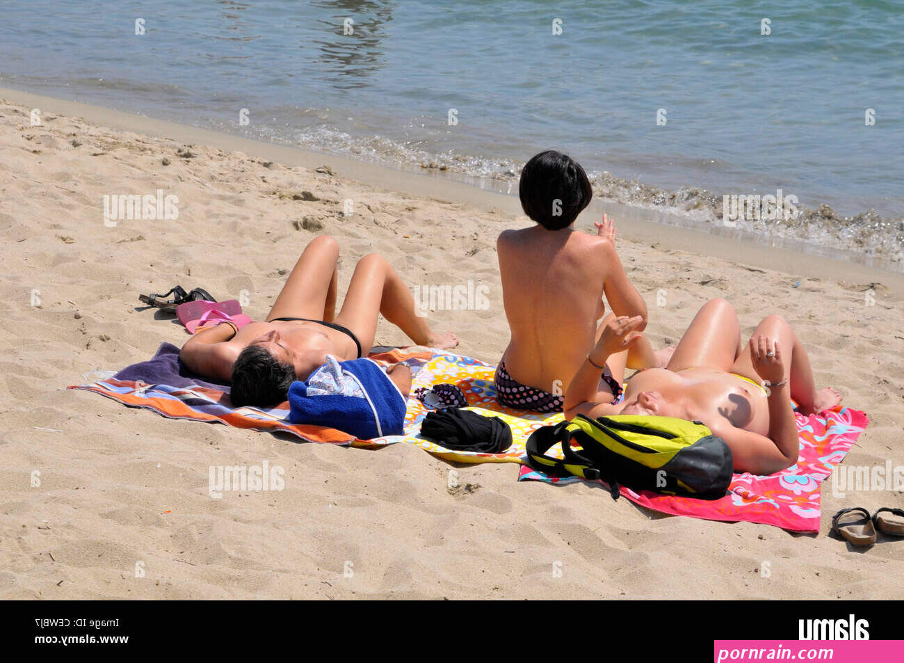 Nude Female Bathers Barceloneta Beach Barcelona Spain Europe Catalonia Stock Photo