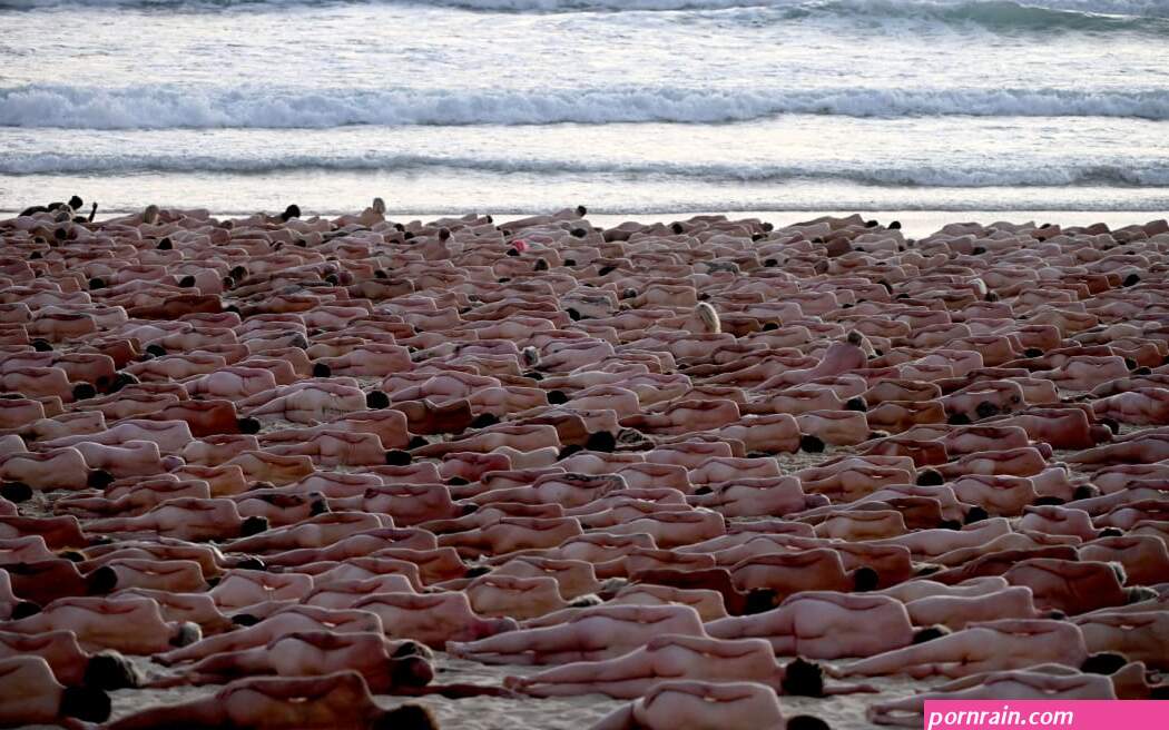 Bondi Beach goes nude as thousands strip off for Spencer Tunick art project
