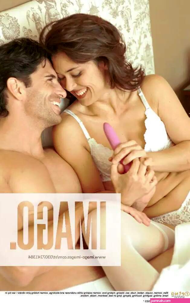 Man woman couple naked nude sex kissing making love woman wearing white Man woman couple