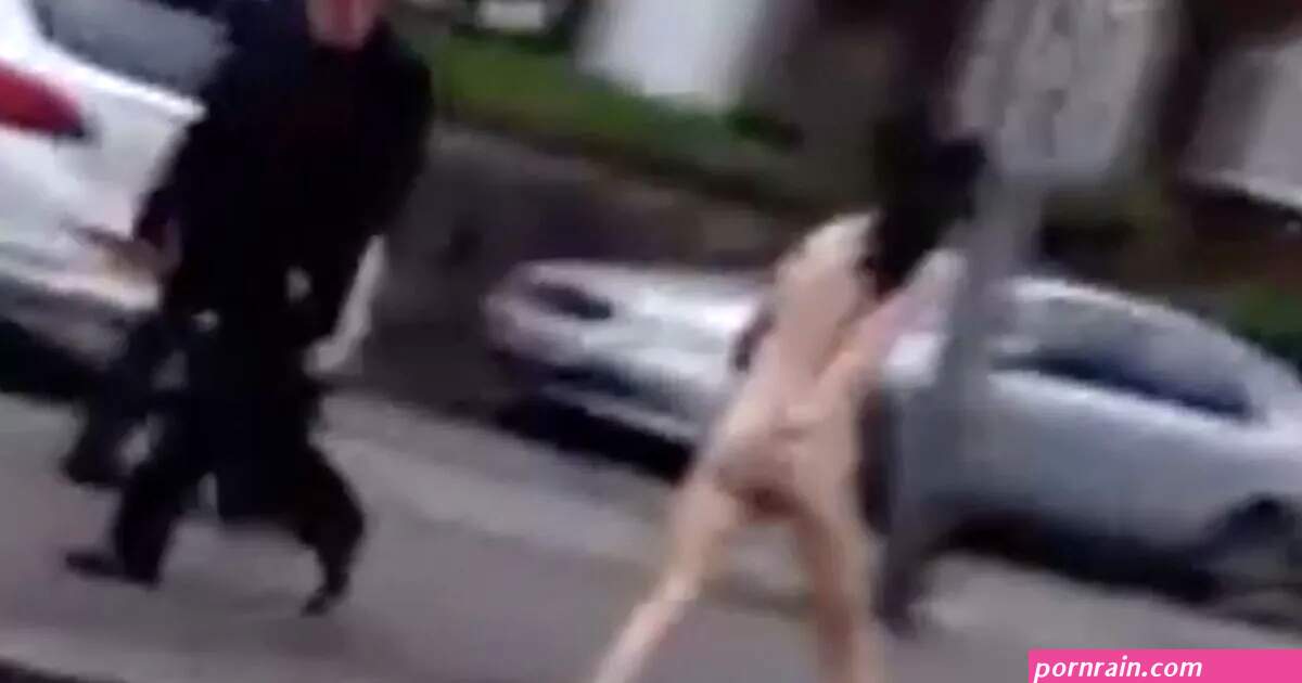 Mystery naked woman looking distressed spotted running through the street by onlookers