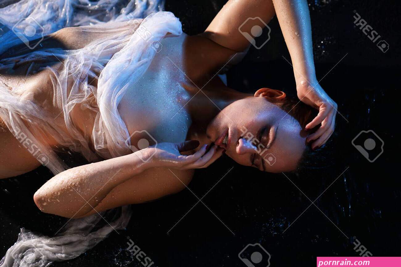 Beautiful Nude Woman In Aqua. Naked Female Body In Transparent Fabric In Neon Light Stock Photo Picture and Royalty Free Image. Image 146134087.