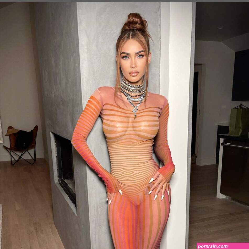 Megan Fox wears see-through orange naked dress and nipple covers