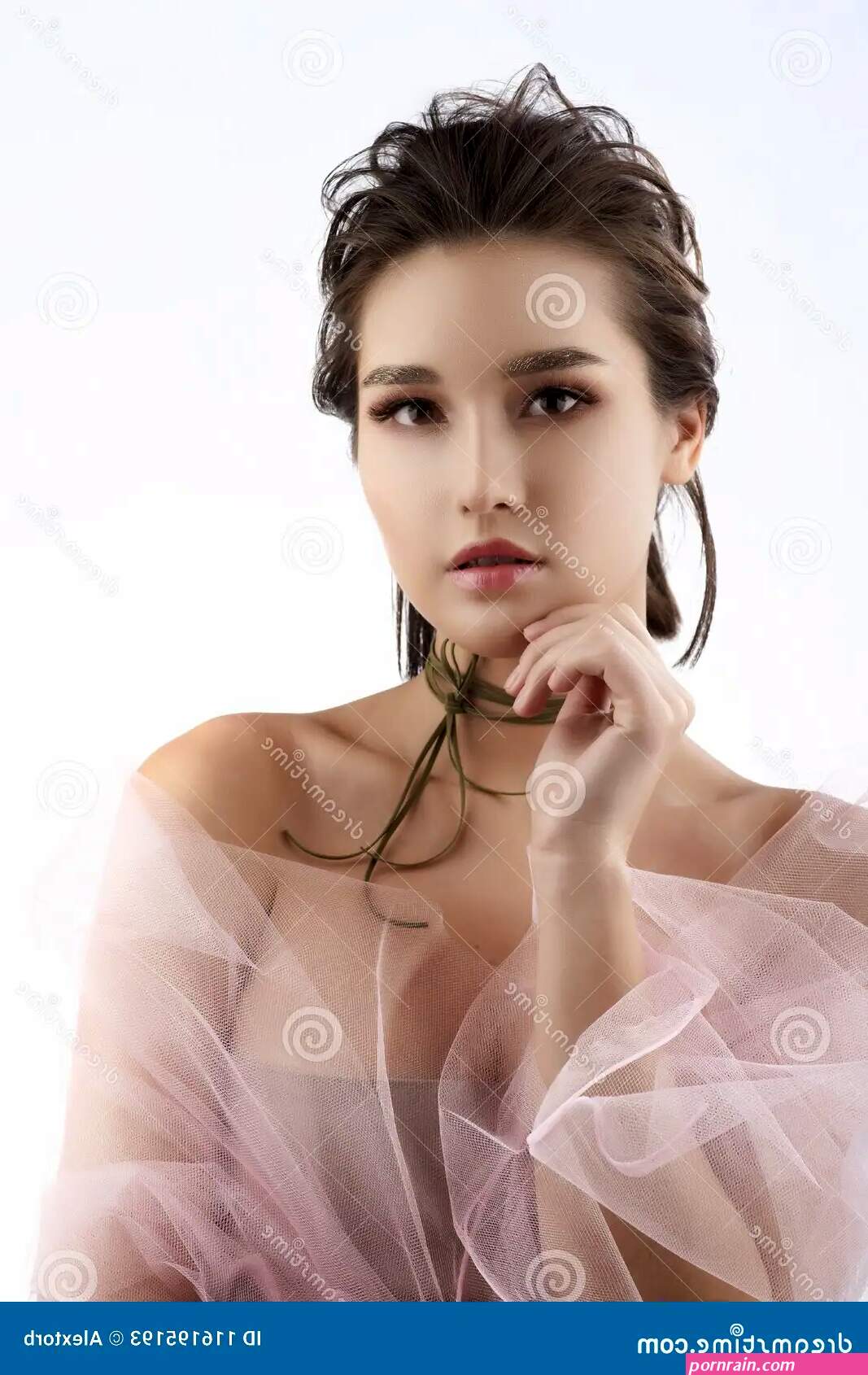 Beautiful Young Big Breast Asian Girl Wearing a Pink Veil on Her Stock Image