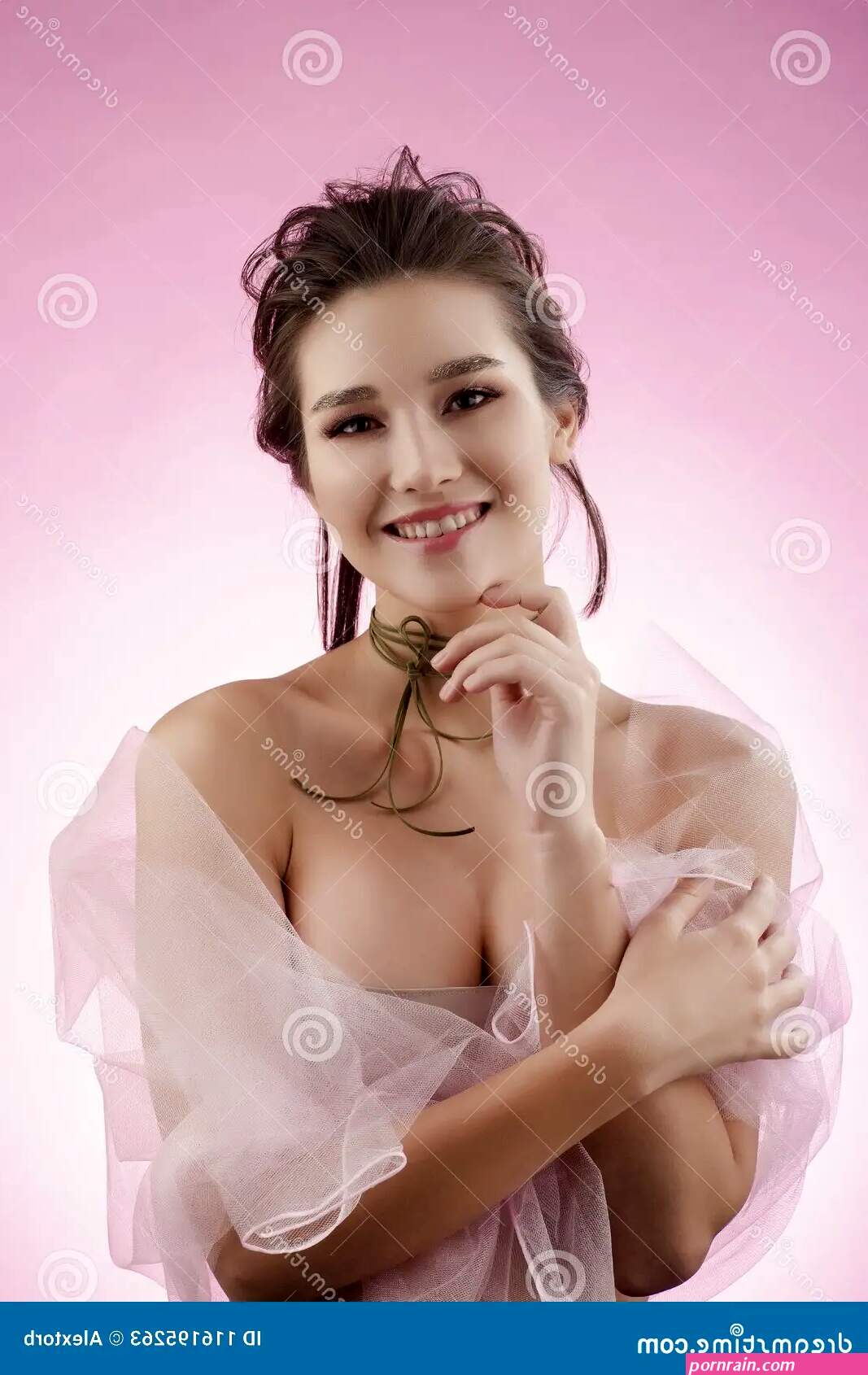 Beautiful Smiling Big Breast Asian Girl Wearing a Pink Veil on H Stock Image