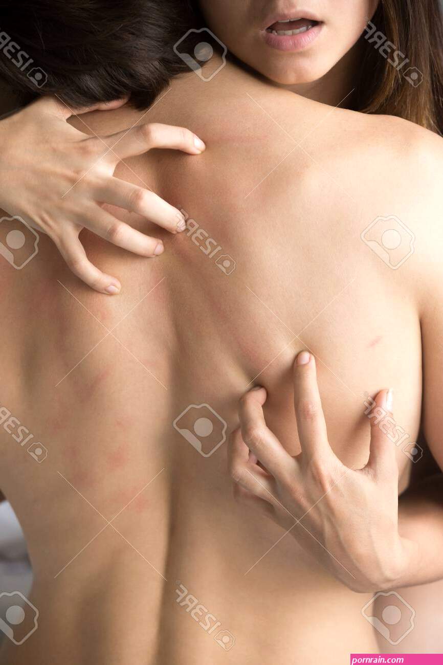 Passionate Woman Scratch Boyfriend Back While Having Intense Sex In Bedroom Sensual Young Couple Making Love Enjoying Hot Intimate Moment Together Concept Lovers Feel Desire Relaxing In Bed