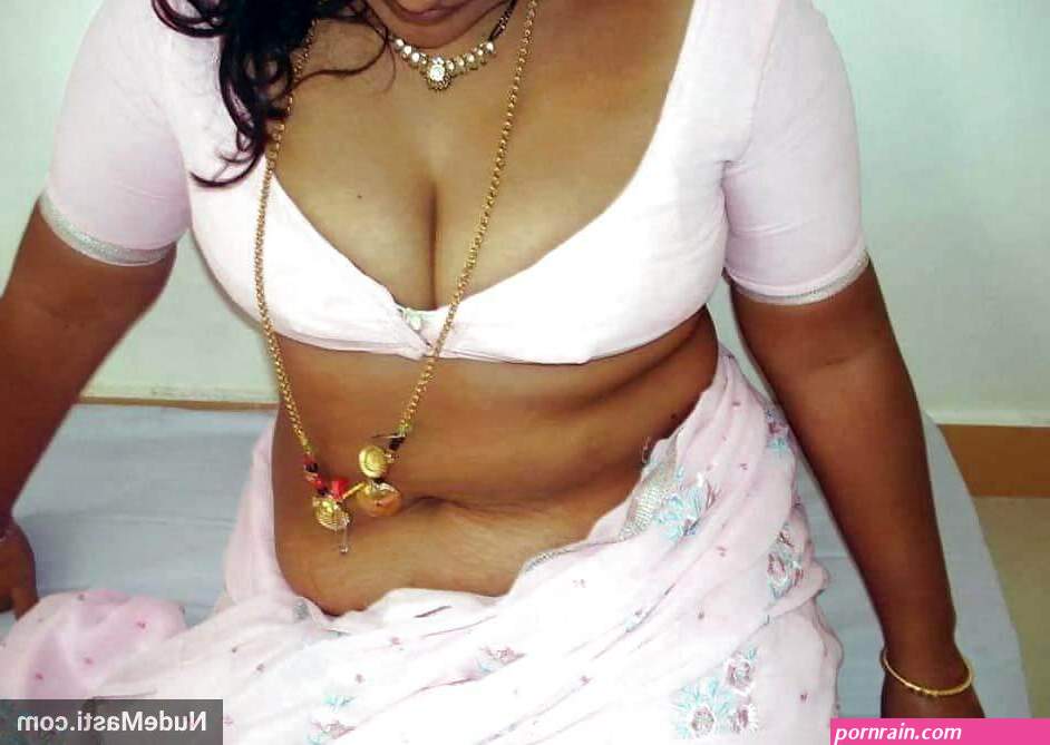 35 Big Indian boobs imprisoned in blouse pics!