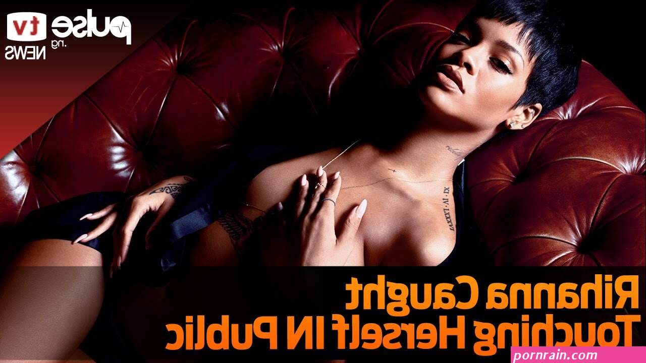 Rihanna Caught on Camera touching Her Boobs at LA Clippers Game