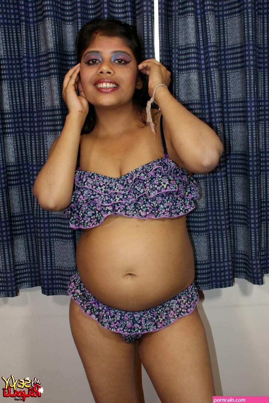 Nasty Indian chick in funny lingerie gets naked and shows her fat pussy and tits. Picture 4.