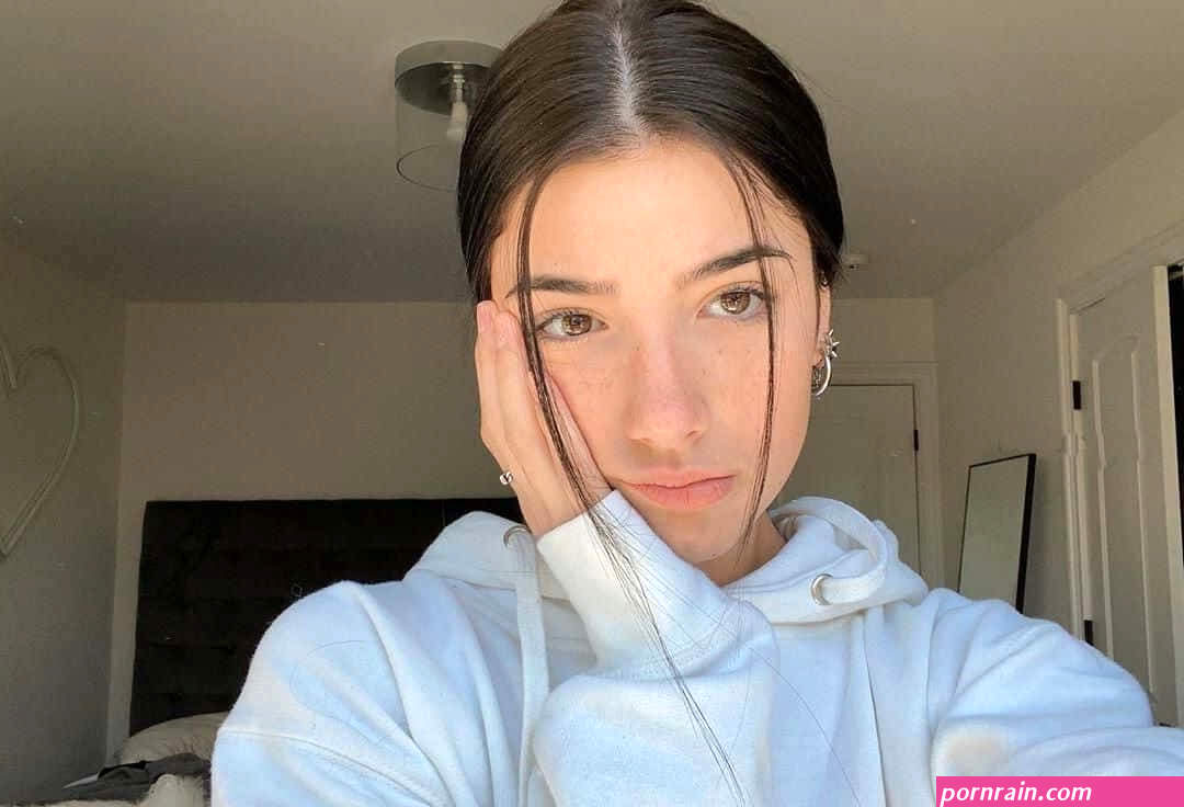 Download Charlie Damelio In White Hoodie Selfie Wallpaper