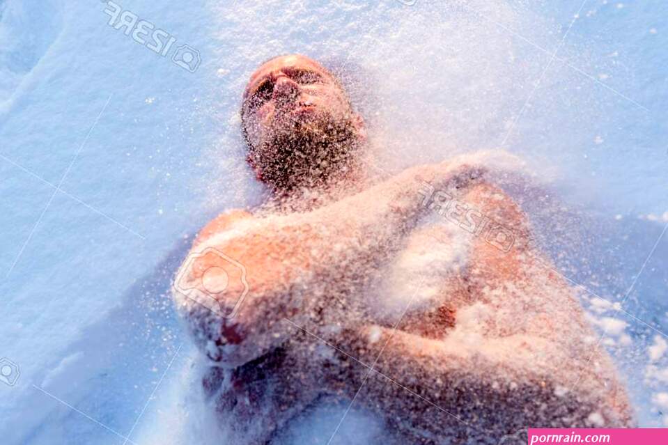 Naked Man Swiming In The Snow In Cold Winter Weather Stock Photo Picture and Royalty Free Image. Image 113791752.