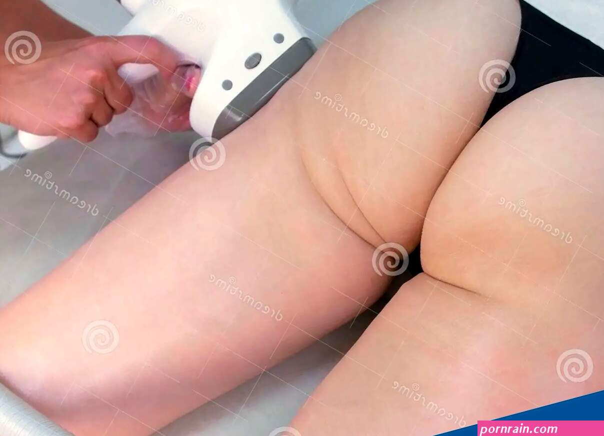 Cosmetologist Makes a Woman in Lpg Massage with Oil on the Booty and Hips. Booty and Hands Close-up Top View. Stock Image