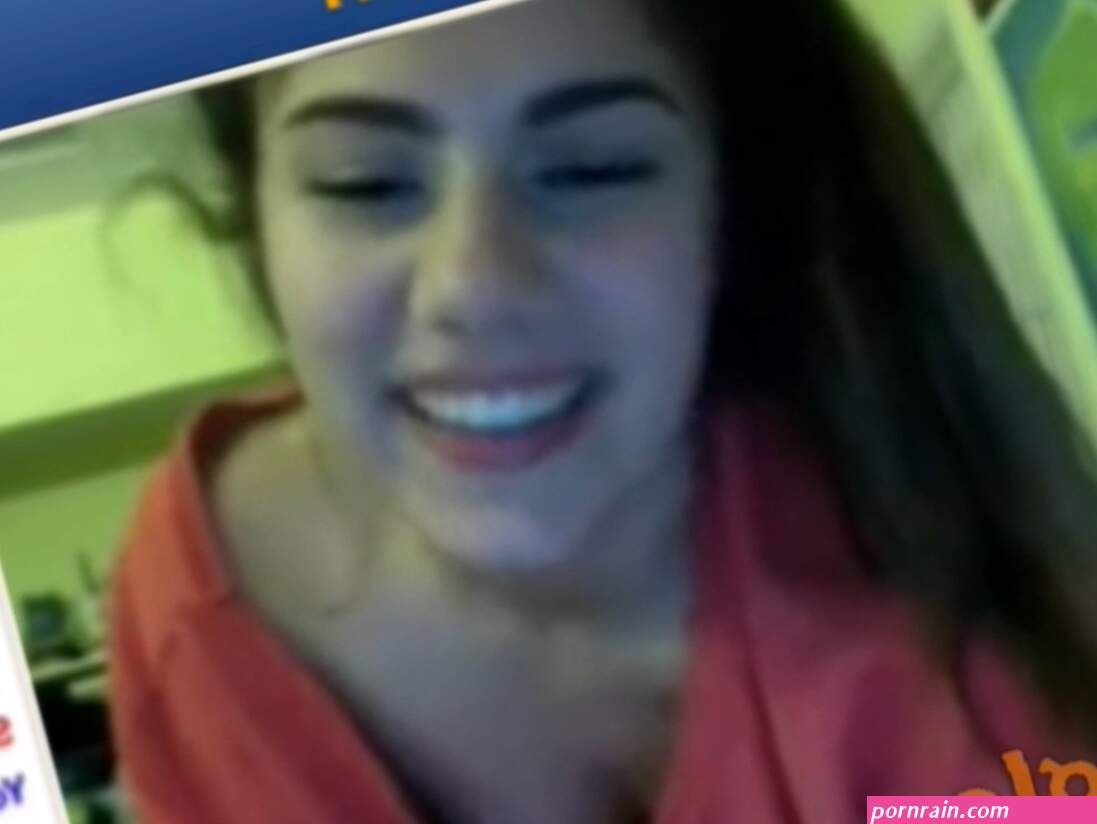 Playful beautiful girl having fun in omegle chat