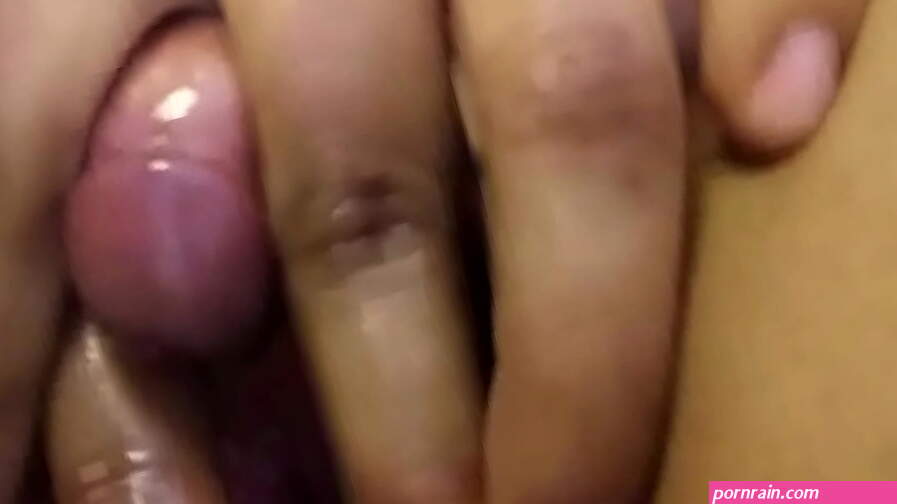 Ebony girl is rubbing her large clitoris