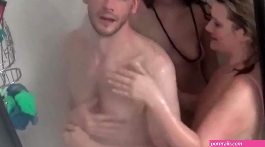 Wet Amateur Babes Sharing Stiff Cock in Shower Threesome