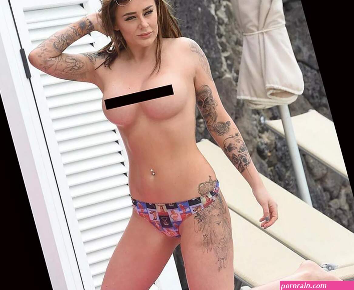 Chelsea Ferguson goes topless by the pool