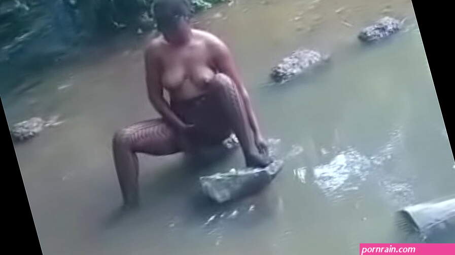 hot african woman taking bath